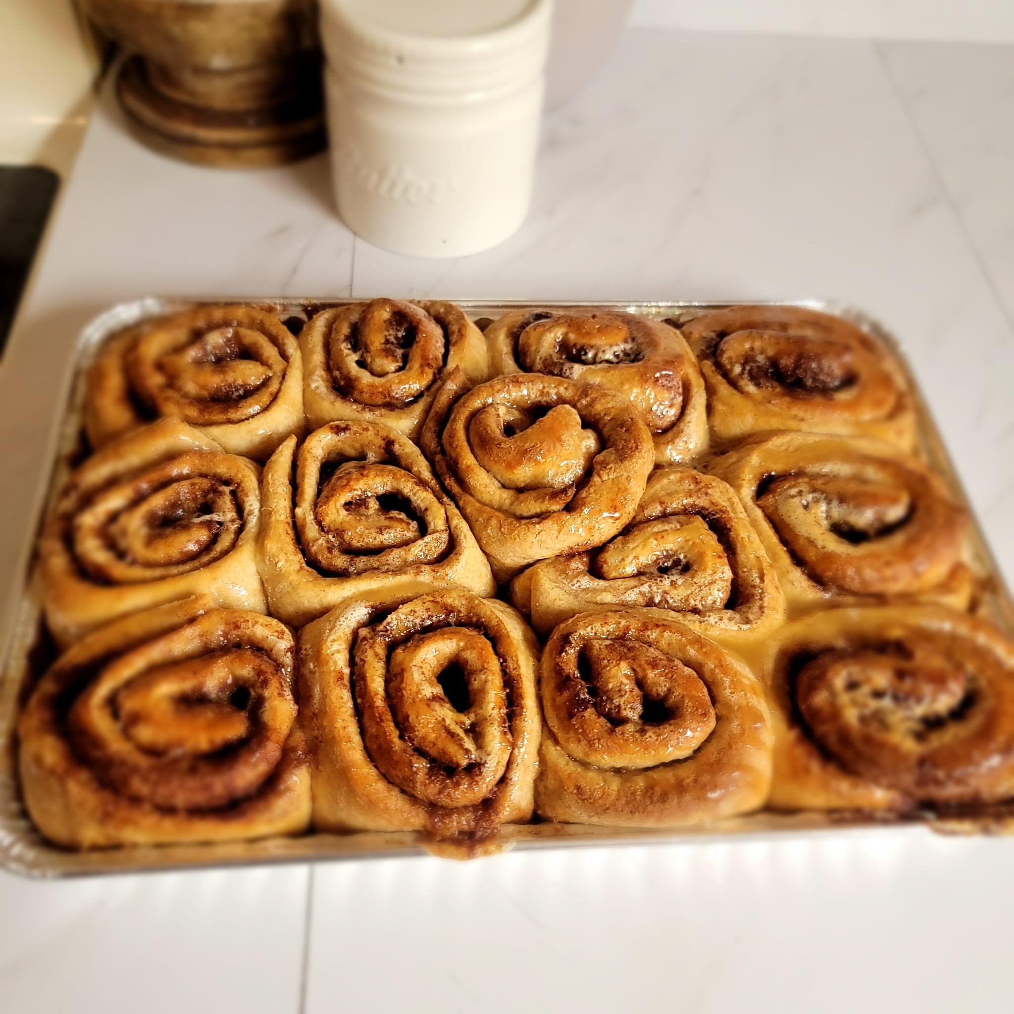 Pan of glazed cinnamon rolls