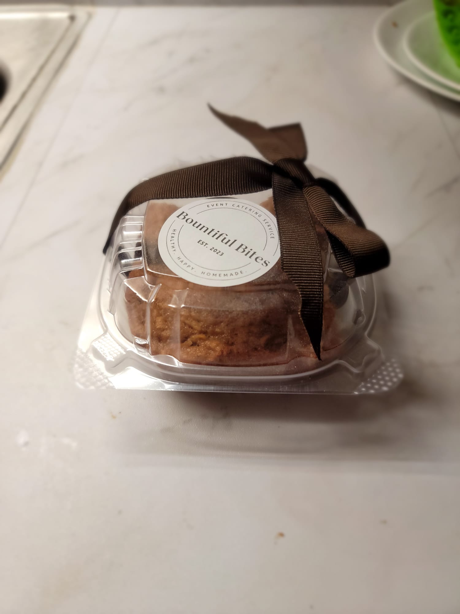 Packaged dessert loaf with Bountiful Bites label